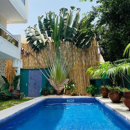 L'Oasis Guesthouse Cotonou Exterior photo