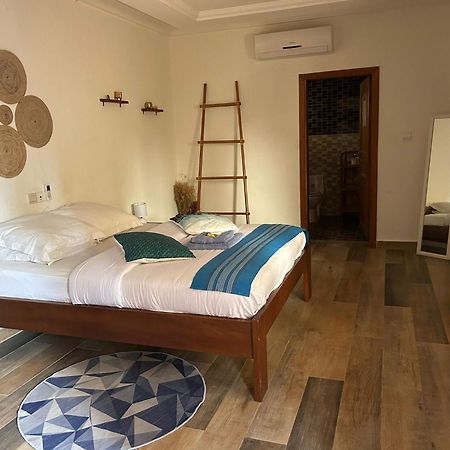 L'Oasis Guesthouse Cotonou Exterior photo