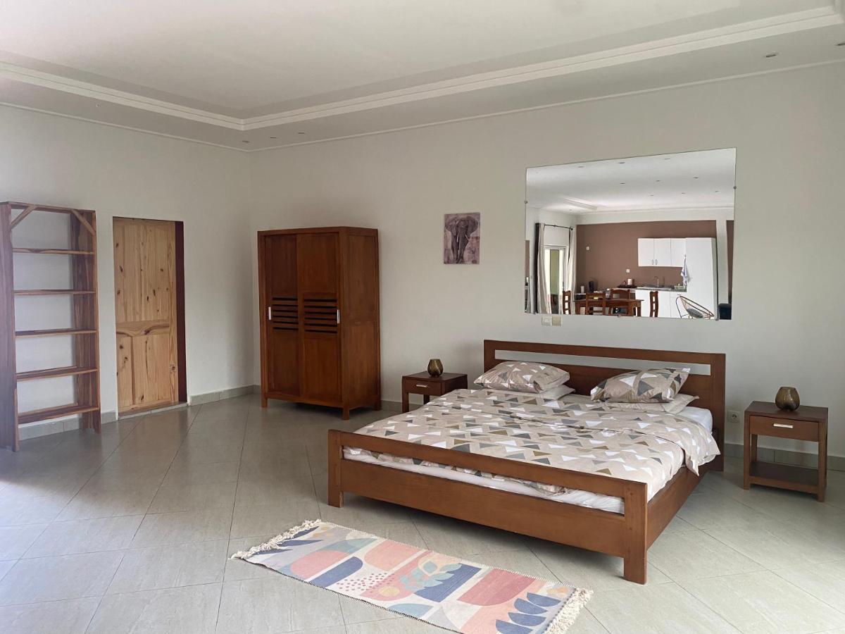 L'Oasis Guesthouse Cotonou Exterior photo