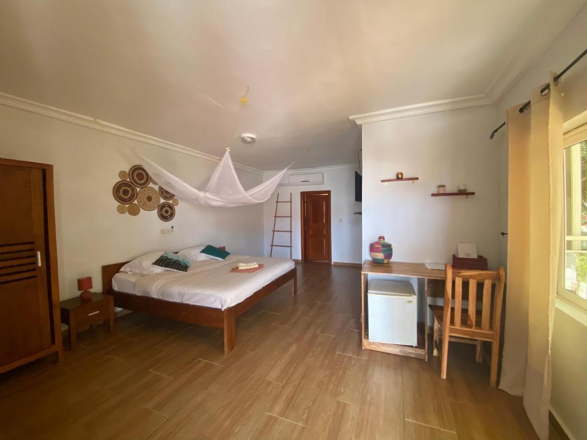L'Oasis Guesthouse Cotonou Exterior photo