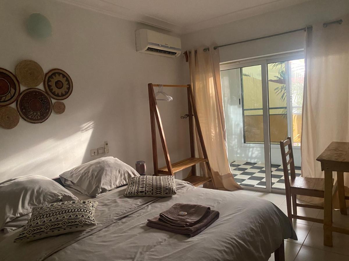 L'Oasis Guesthouse Cotonou Exterior photo