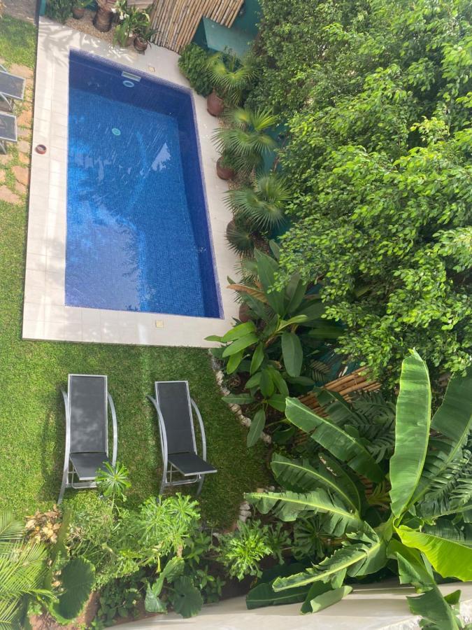 L'Oasis Guesthouse Cotonou Exterior photo