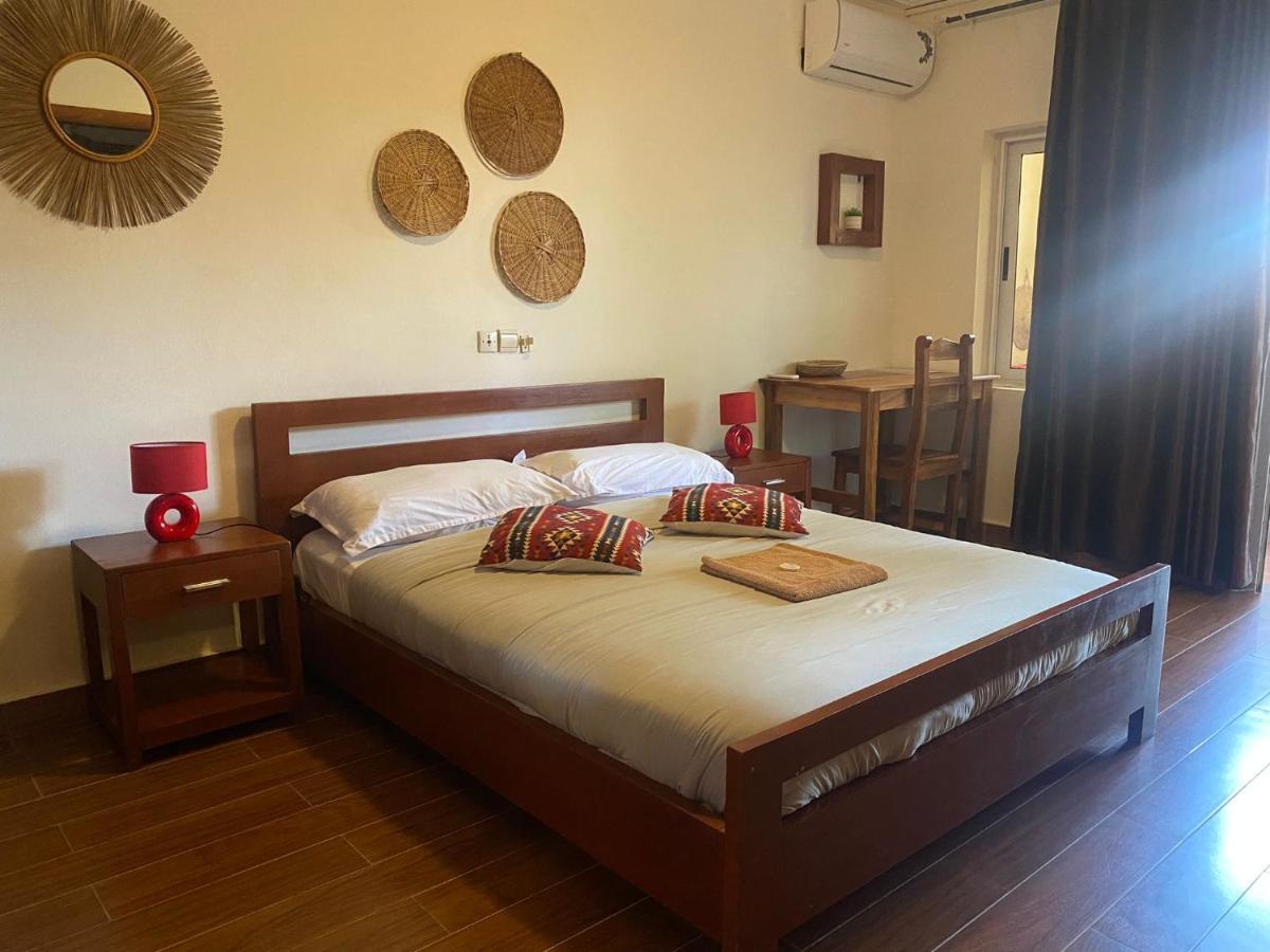 L'Oasis Guesthouse Cotonou Exterior photo
