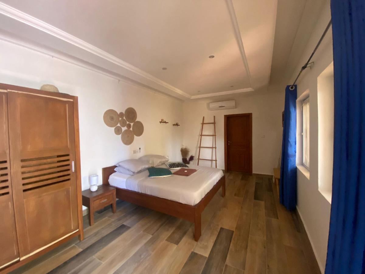 L'Oasis Guesthouse Cotonou Exterior photo