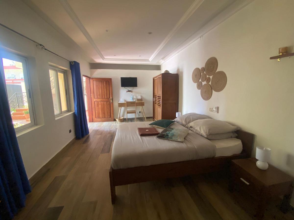 L'Oasis Guesthouse Cotonou Exterior photo