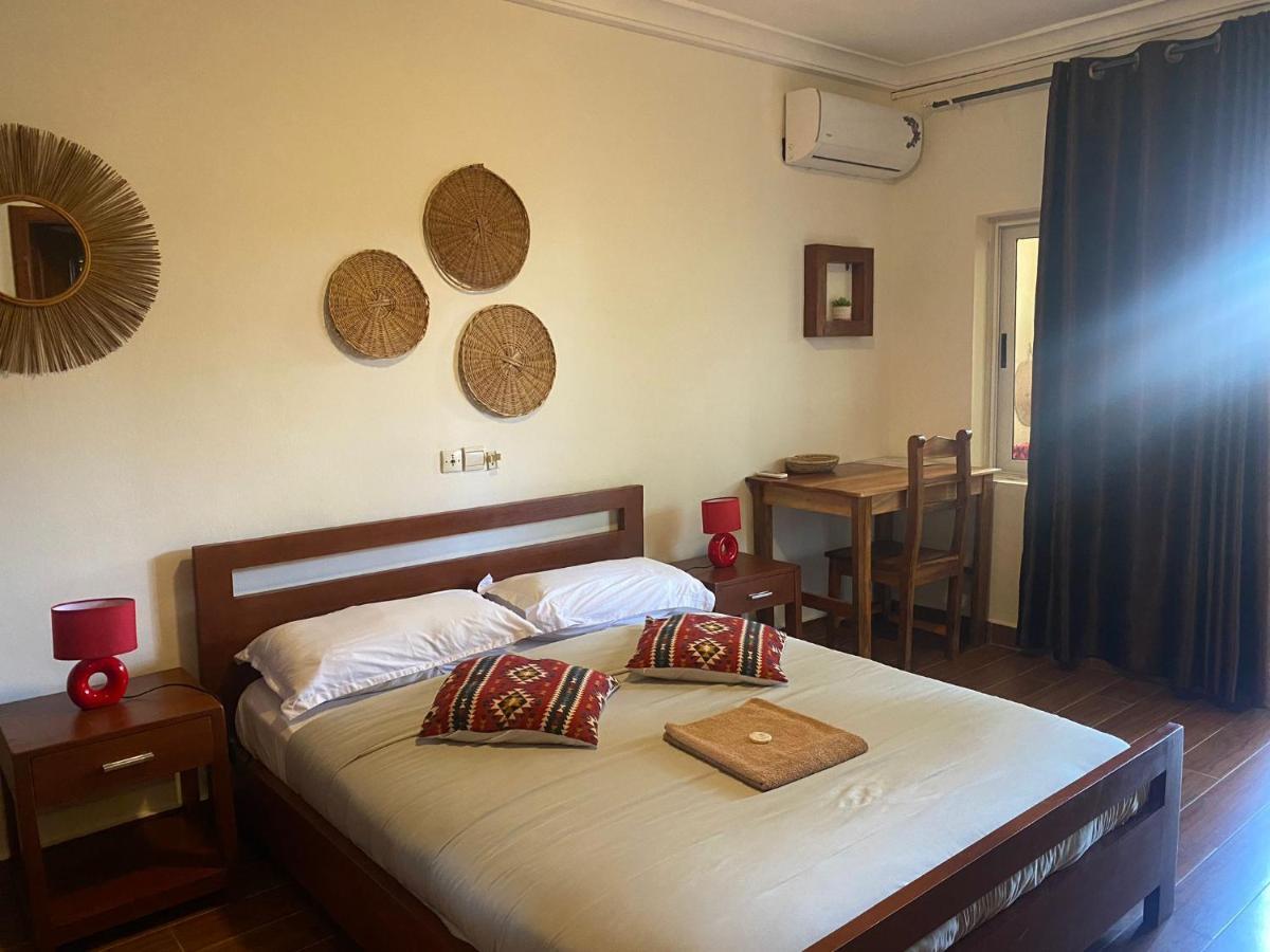 L'Oasis Guesthouse Cotonou Exterior photo