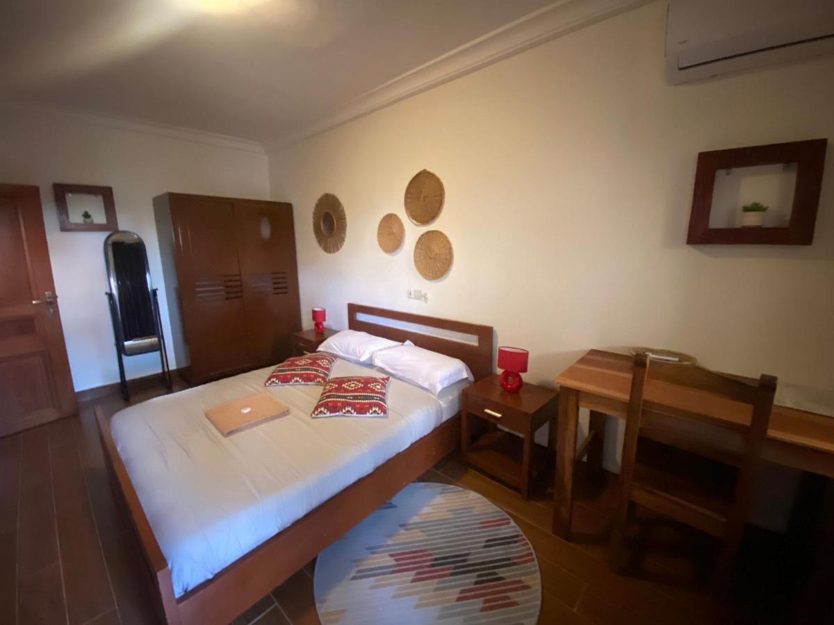 L'Oasis Guesthouse Cotonou Exterior photo