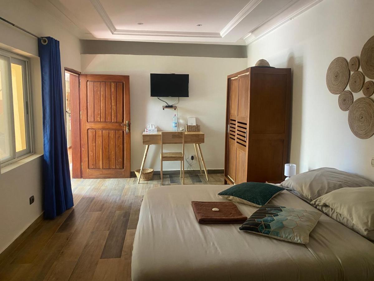L'Oasis Guesthouse Cotonou Exterior photo