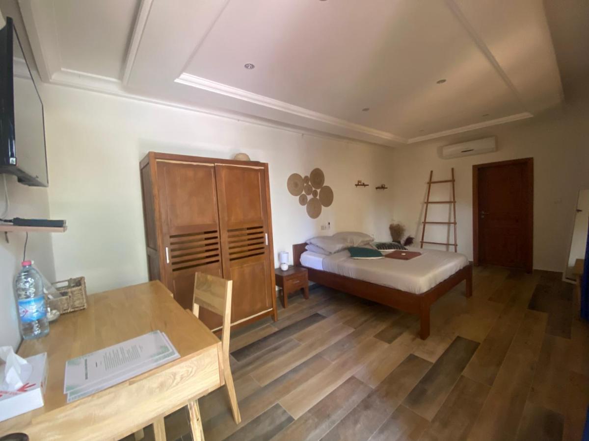 L'Oasis Guesthouse Cotonou Exterior photo