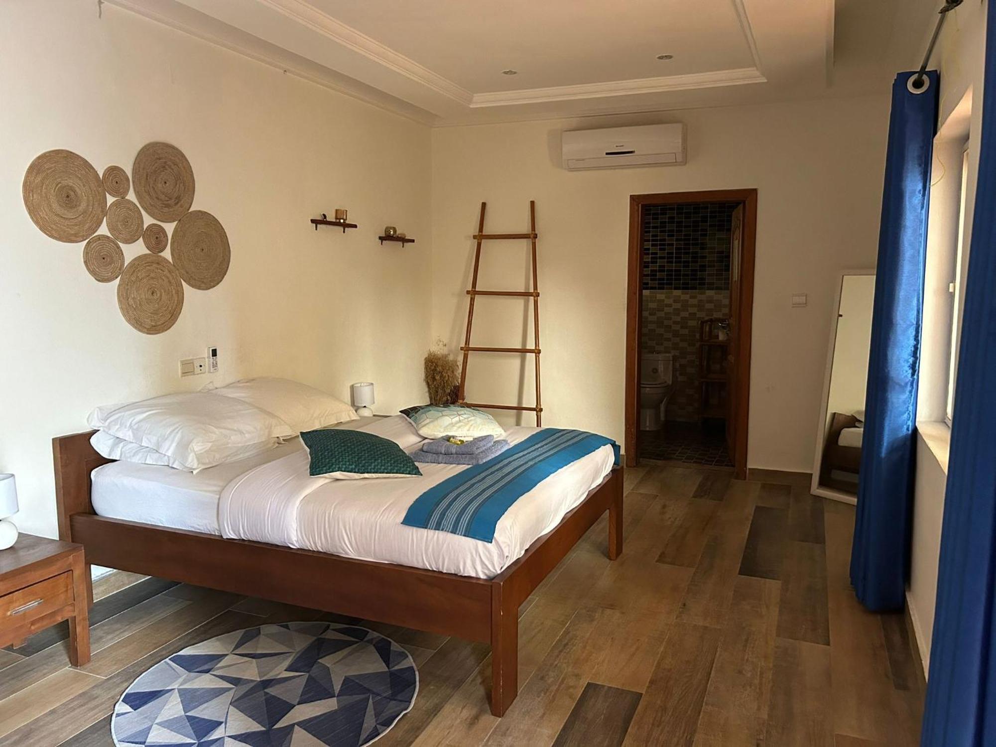 L'Oasis Guesthouse Cotonou Exterior photo
