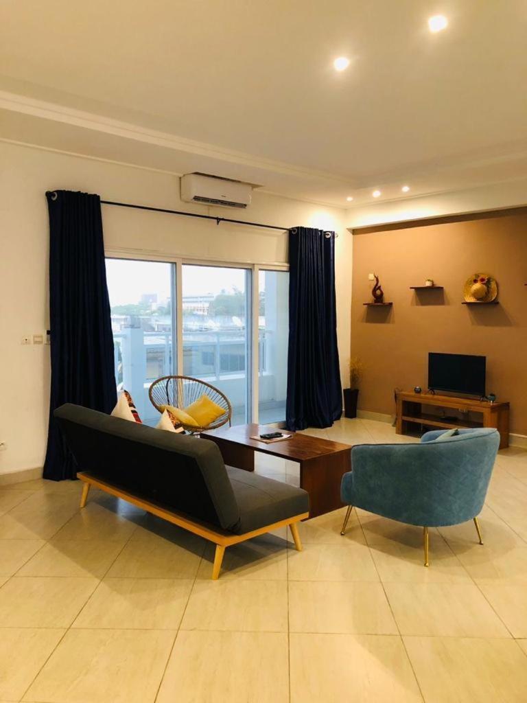 L'Oasis Guesthouse Cotonou Exterior photo