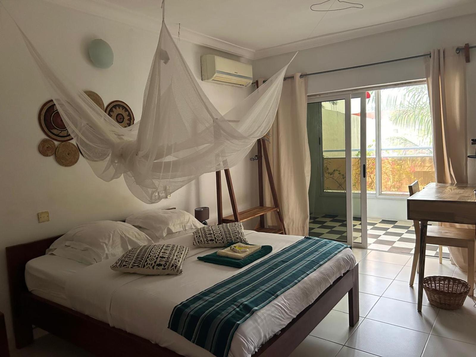 L'Oasis Guesthouse Cotonou Exterior photo
