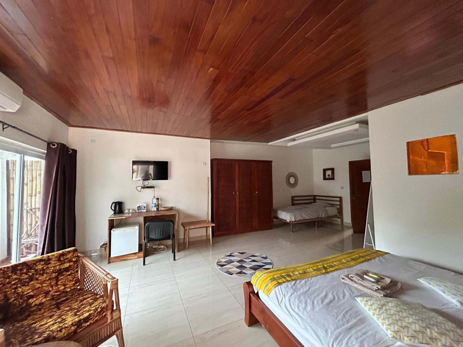 L'Oasis Guesthouse Cotonou Exterior photo