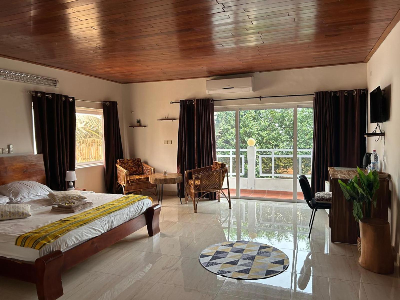 L'Oasis Guesthouse Cotonou Exterior photo