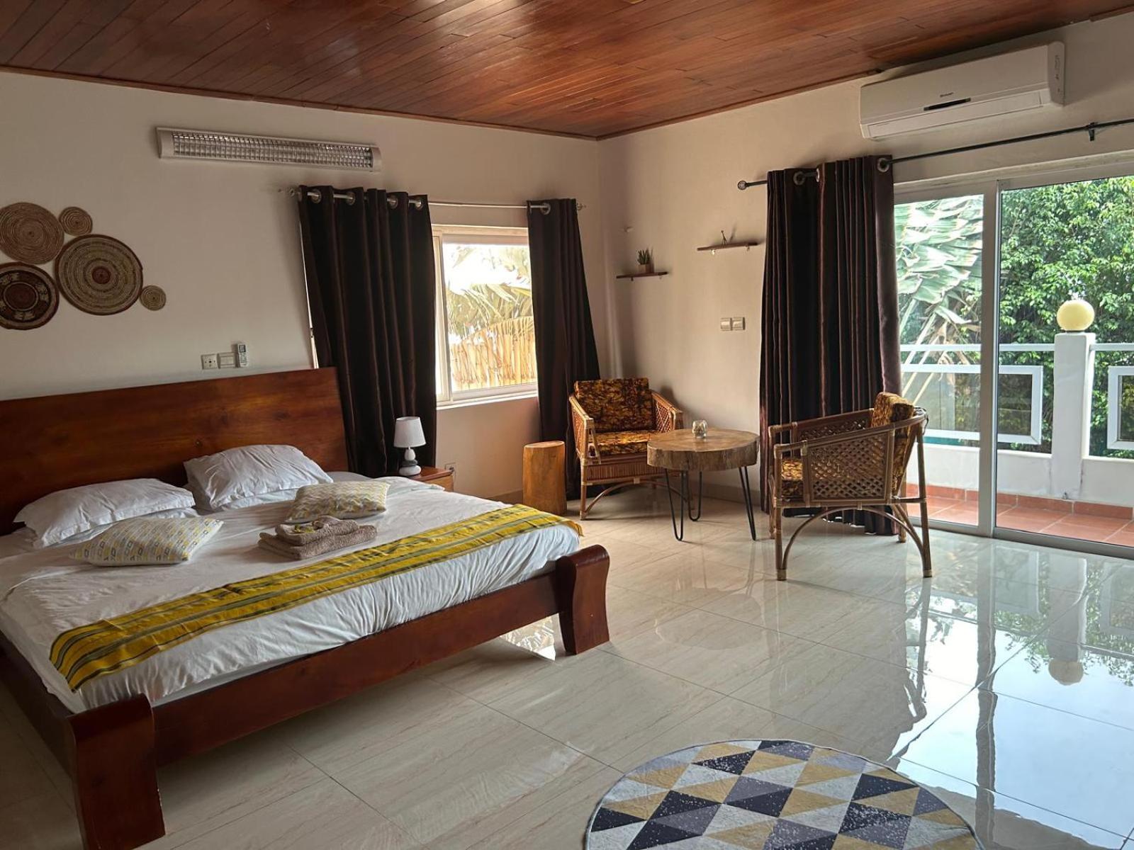 L'Oasis Guesthouse Cotonou Exterior photo