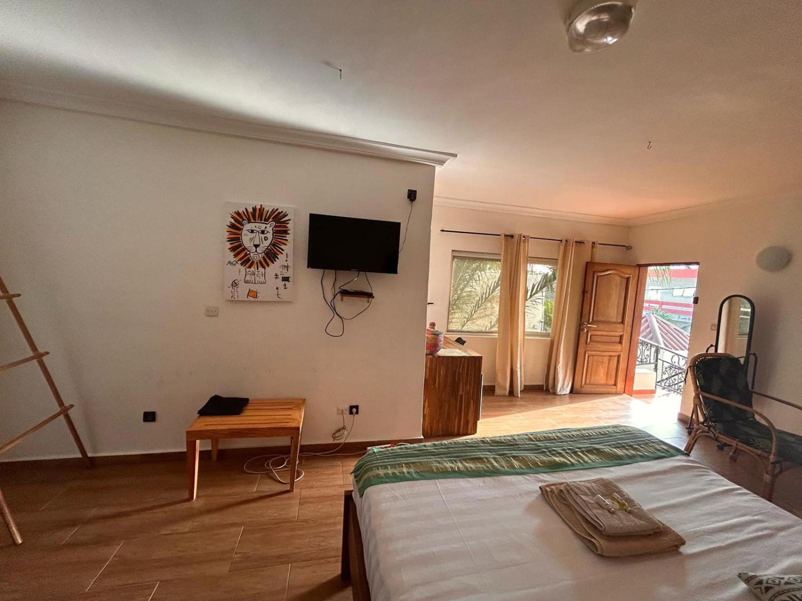 L'Oasis Guesthouse Cotonou Exterior photo